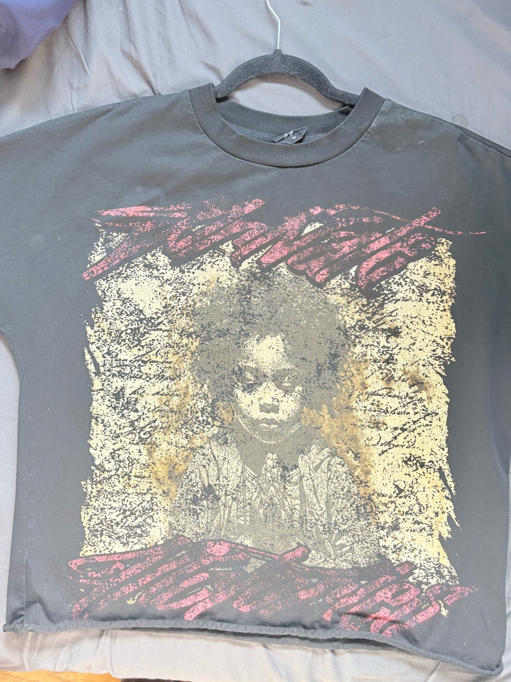 Vintage-Style Black Short Sleeve Tee with Yellow & Pink Graphic
